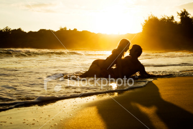 ist2_5602715_young_couple_at_sunset.jpg